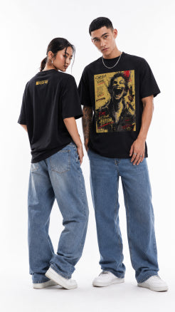 Models wearing HUGFAB black system error graphic oversized T-shirts with baggy jeans on white background