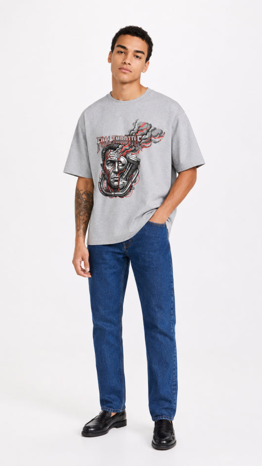 Model wearing HUGFAB grey full throttle graphic oversized T-shirt with blue jeans on white background