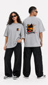 HUGFAB unisex grey oversized Theyyam graphic t-shirt with front chest print and bold back artwork, styled with black streetwear pants