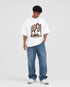 HUGFAB Heritage Ride white oversized graphic T-shirt worn by male model with baggy blue jeans
