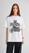 HUGFAB white oversized graphic T-shirt with black skull motorcycle print worn by model in streetwear style