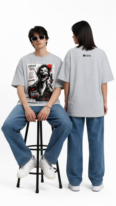 HUGFAB grey oversized T-shirt with bold System Error horror glitch graphic print styled by models in jeans