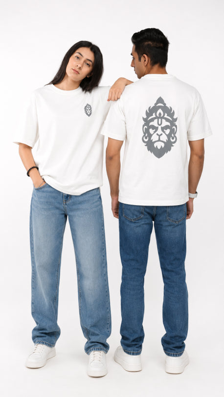 HUGFAB unisex white oversized graphic t-shirt with minimal front logo and bold lion back print, styled with blue jeans for clean streetwear fashion