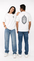 HUGFAB unisex white oversized graphic t-shirt with minimal front logo and bold lion back print, styled with blue jeans for clean streetwear fashion